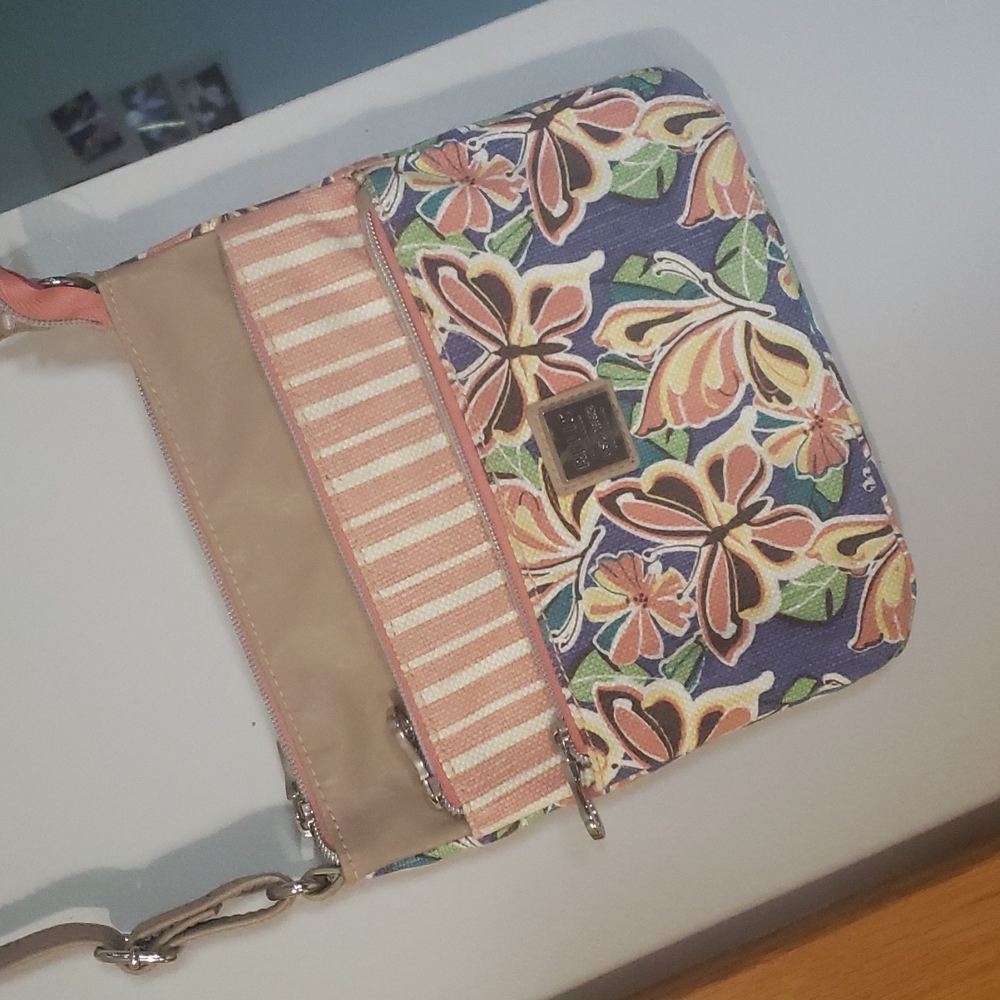 Relic crossbody bag with butterfly/striped pattern